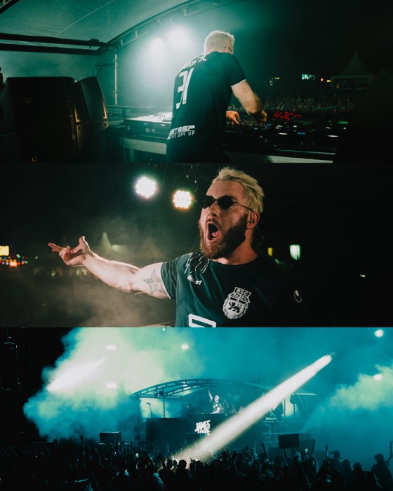 DJ James Hype performt auf einer nächtlichen Festivalbühne mit hellen Scheinwerfern und Nebel vor feierndem Publikum